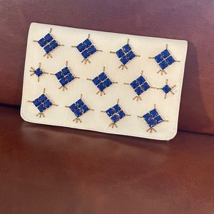 Blue and white jeweled clutch
